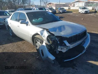 2001 Cadillac DeVille DHS z VIN 1G6KE57Y01U200554, wystawiony jako IAAI lot #41356119 z przebiegiem Nie podano mil oraz . Historia ofert i sprzedaży dostępna na DreamBid. Obrazek 1.