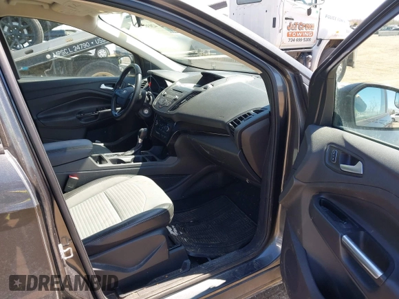2017 Ford Escape SE with VIN 1FMCU0G92HUF10596, listed as a IAAI auction lot 42038215 with 145,735 mi miles. Bid and sale history available at carsss.com. Image 5.