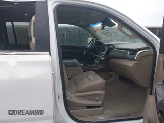 2018 Chevrolet Suburban LT with VIN 1GNSCHKC2JR376239, listed as a IAAI auction lot 42110551 with 123,694 mi miles and . Bid and sale history available at DreamBid. Image 5.
