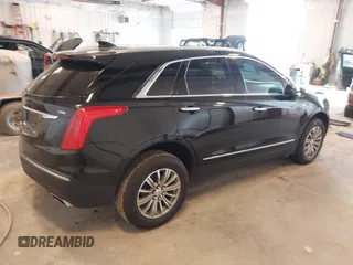 2019 Cadillac XT5 Luxury FWD z VIN 1GYKNCRS2KZ197052, wystawiony jako IAAI lot #42242466 z przebiegiem 86 678 mil mil oraz . Historia ofert i sprzedaży dostępna na DreamBid. Obrazek 4.