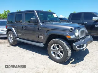 2021 Jeep Wrangler Unlimited Sahara with VIN 1C4HJXEN3MW592235, listed as a IAAI auction lot 42690167 with 103,351 mi miles and . Bid and sale history available at DreamBid. Image 1.