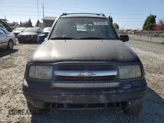 2002 Chevrolet Tracker ZR2 with VIN 2CNBJ734X26948098, listed as a Copart auction lot 73135754 with 234,627 mi miles and Salvage title. Bid and sale history available at DreamBid. Image 5.