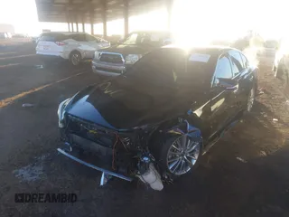 2018 Infiniti Q50 Luxe with VIN JN1EV7AP7JM590173, listed as a IAAI auction lot 41298515 with 99,415 mi miles and . Bid and sale history available at DreamBid. Image 2.