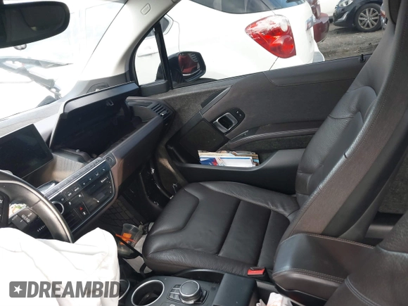 2017 BMW i3 z VIN WBY1Z8C55HV551697, wystawiony jako IAAI lot #41534229 z przebiegiem Nie podano mil oraz . Historia ofert i sprzedaży dostępna na DreamBid. Obrazek 5.