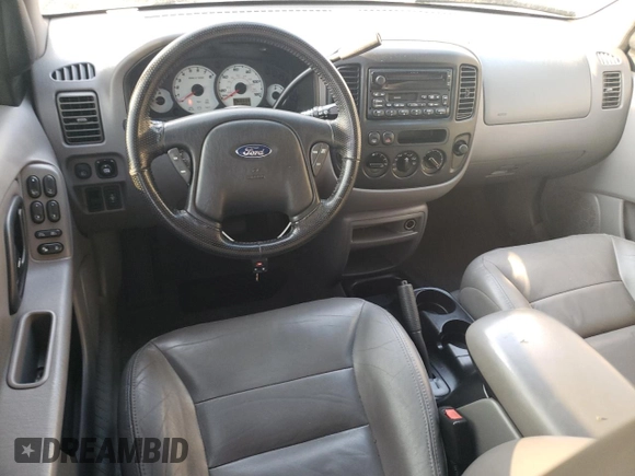 2001 Ford Escape XLT with VIN 1FMCU04141KB40767, listed as a Copart auction lot 71492664 with 118,541 mi miles and Salvage Title. Bid and sale history available at DreamBid. Image 8.