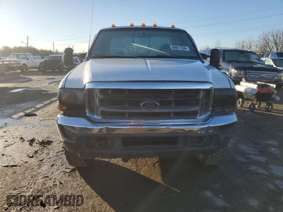 1999 Ford F-250 XL with VIN 1FTNX21S8XEC58955, listed as a Copart auction lot 84917334 with 272,953 mi miles and Salvage title. Bid and sale history available at DreamBid. Image 5.
