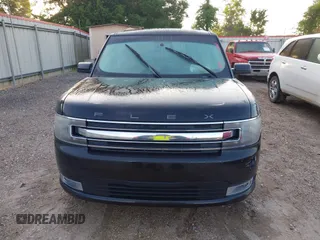 2014 Ford Flex SEL z VIN 2FMGK5C8XEBD24744, wystawiony jako IAAI lot #42365734 z przebiegiem 209 904 mil mil oraz . Historia ofert i sprzedaży dostępna na DreamBid. Obrazek 12.
