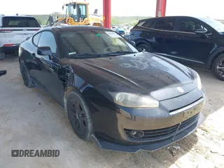 2008 Hyundai Tiburon GS z VIN KMHHM66D18U284226, wystawiony jako IAAI lot #42448502 z przebiegiem 180 828 mil mil oraz . Historia ofert i sprzedaży dostępna na DreamBid. Obrazek 1.