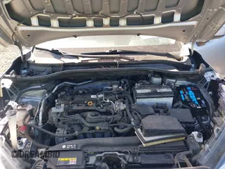 2022 Toyota Corolla Cross LE z VIN 7MUCAABG1NV021010, wystawiony jako IAAI lot #42082415 z przebiegiem 30 395 mil mil oraz . Historia ofert i sprzedaży dostępna na DreamBid. Obrazek 10.