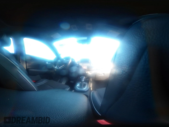 2020 Kia Forte GT-Line z VIN 3KPF34AD7LE167672, wystawiony jako IAAI lot #41312641 z przebiegiem 64 569 mil mil oraz . Historia ofert i sprzedaży dostępna na DreamBid. Obrazek 18.