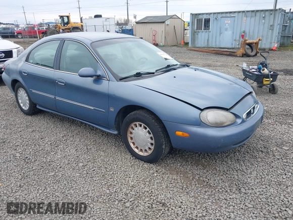1999 Mercury Sable LS z VIN 1MEFM53S5XA647862, wystawiony jako IAAI lot #41762714 z przebiegiem 165 490 mil mil oraz . Historia ofert i sprzedaży dostępna na DreamBid. Obrazek 1.