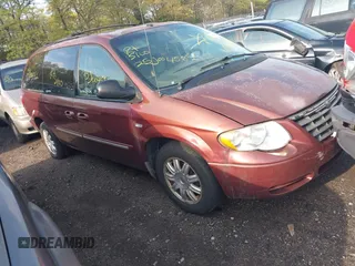 2007 Chrysler Town & Country Touring with VIN 2A4GP54L97R230853, listed as a IAAI auction lot 42184080 with Not provided miles and . Bid and sale history available at DreamBid. Image 1.