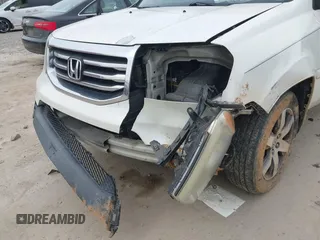 2013 Honda Pilot Touring with VIN 5FNYF3H98DB025516, listed as a IAAI auction lot 41767097 with 202,908 mi miles and . Bid and sale history available at DreamBid. Image 6.