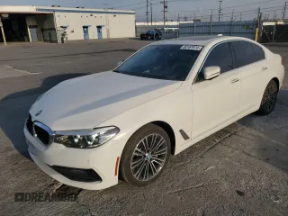 2018 BMW 5 Series 530i with VIN WBAJA5C54JWA38044, listed as a Copart auction lot 86167974 with 82,200 mi miles and Salvage Title. Bid and sale history available at carsss.com. Image 1.