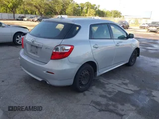 2009 Toyota Matrix with VIN 2T1KU40E59C106253, listed as a IAAI auction lot 41974823 with 126,155 mi miles. Bid and sale history available at carsss.com. Image 4.