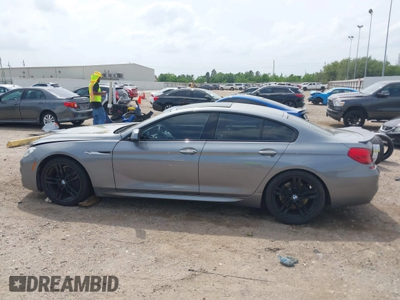 2014 BMW 6 Series 650i z VIN WBA6B2C55ED128934, wystawiony jako IAAI lot #42070641 z przebiegiem 102 597 mil mil oraz . Historia ofert i sprzedaży dostępna na DreamBid. Obrazek 14.