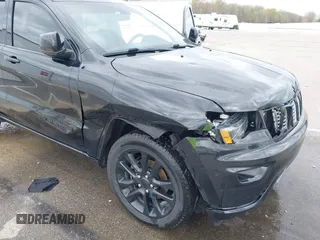 2018 Jeep Grand Cherokee Laredo with VIN 1C4RJFAG7JC468391, listed as a IAAI auction lot 42010443 with 91,585 mi miles and . Bid and sale history available at DreamBid. Image 6.