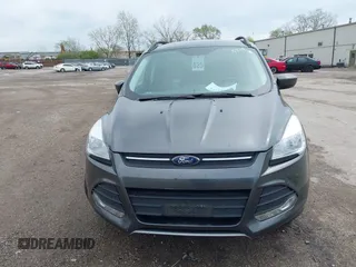 2016 Ford Escape SE with VIN 1FMCU9GX0GUC21749, listed as a IAAI auction lot 42115212 with 149,027 mi miles. Bid and sale history available at carsss.com. Image 12.