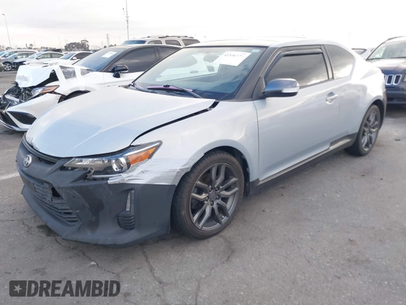 2014 Scion tC z VIN JTKJF5C79E3073875, wystawiony jako IAAI lot #41536021 z przebiegiem 158 154 mil mil oraz . Historia ofert i sprzedaży dostępna na DreamBid. Obrazek 2.