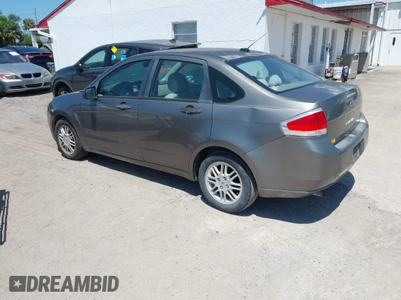 2011 Ford Focus SE with VIN 1FAHP3FN4BW174842, listed as a IAAI auction lot 42027681 with 58,616 mi miles. Bid and sale history available at carsss.com. Image 3.
