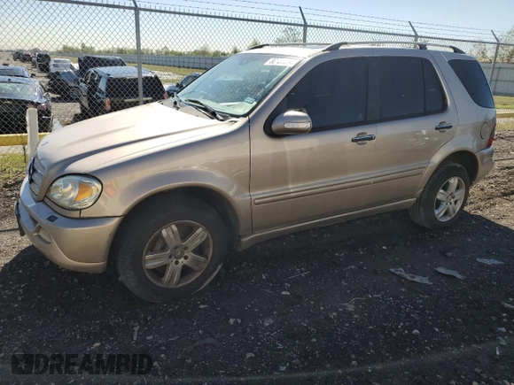 2005 Mercedes-Benz M 500 with VIN 4JGAB75E85A529110, listed as a Copart auction lot 80557034 with 130,560 mi miles and Salvage title. Bid and sale history available at DreamBid. Image 1.