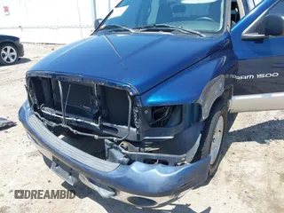 2004 Dodge 1500 SLT with VIN 1D7HA18D84S529788, listed as a IAAI auction lot 42006080 with 153,312 mi miles. Bid and sale history available at carsss.com. Image 6.