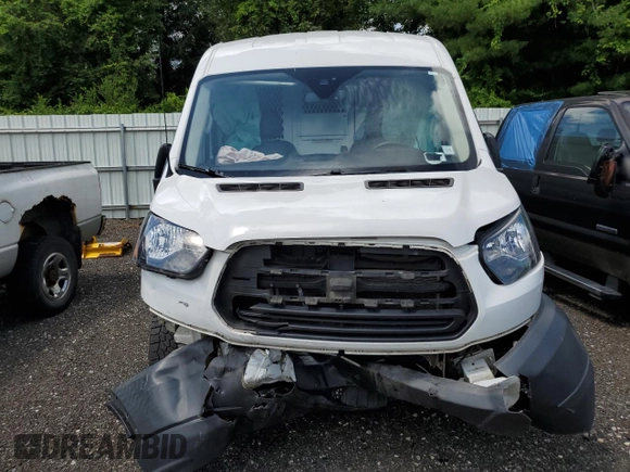 2018 Ford Transit z VIN 1FTYR2CMXJKA85664, wystawiony jako Copart lot #62708365 z przebiegiem Nie podano mil oraz Szkoda całkowita • Salvage title. Historia ofert i sprzedaży dostępna na DreamBid. Obrazek 5.