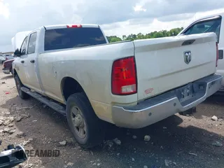 2018 Ram 2500 Tradesman z VIN 3C6UR5HJ5JG284053, wystawiony jako IAAI lot #42672148 z przebiegiem 158 783 mil mil oraz . Historia ofert i sprzedaży dostępna na DreamBid. Obrazek 3.