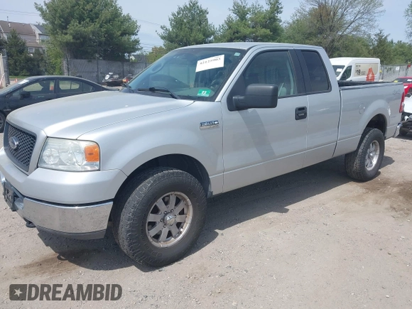 2005 Ford F-150 STX with VIN 1FTRX14W85NA00409, listed as a IAAI auction lot 42125903 with 160,230 mi miles and . Bid and sale history available at DreamBid. Image 2.