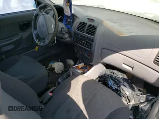 2005 Hyundai Accent GLS with VIN KMHCG35C75U354574, listed as a Copart auction lot 74931444 with 141,013 mi miles and Salvage Title. Bid and sale history available at carsss.com. Image 8.