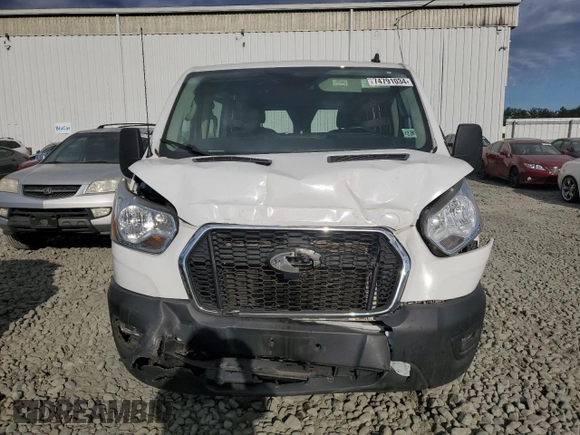 2021 Ford Transit Cargo with VIN 1FTBR1Y87MKA44540, listed as a Copart auction lot 74791034 with 128,242 mi miles and Salvage title. Bid and sale history available at DreamBid. Image 5.
