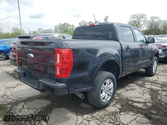 2023 Ford Ranger XL with VIN 1FTER4FH9PLE12457, listed as a Copart auction lot 52674865 with 51,417 mi miles and Salvage title. Bid and sale history available at DreamBid. Image 3.