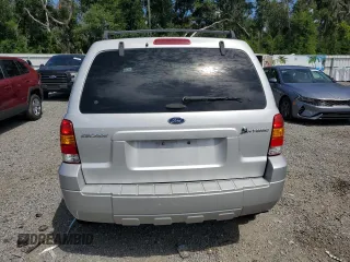 2006 Ford Escape Hybrid z VIN 1FMCU96H36KA35403, wystawiony jako Copart lot #65374705 z przebiegiem 127 689 mil mil oraz Czysty tytuł • Clean title. Historia ofert i sprzedaży dostępna na DreamBid. Obrazek 6.