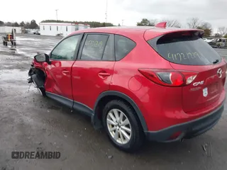 2014 Mazda CX-5 Touring with VIN JM3KE2CY2E0322211, listed as a IAAI auction lot 41721219 with 127,312 mi miles. Bid and sale history available at carsss.com. Image 3.
