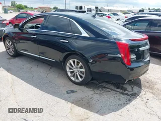 2013 Cadillac XTS Premium with VIN 2G61S5S39D9144177, listed as a IAAI auction lot 42111910 with 69,830 mi miles. Bid and sale history available at carsss.com. Image 3.