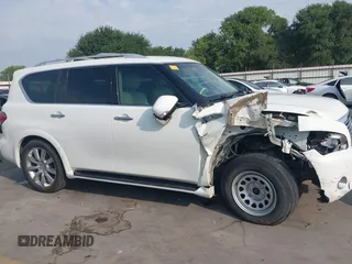 2014 Infiniti QX80 z VIN JN8AZ2NE6E9063136, wystawiony jako IAAI lot #42233348 z przebiegiem 145 988 mil mil oraz . Historia ofert i sprzedaży dostępna na DreamBid. Obrazek 13.