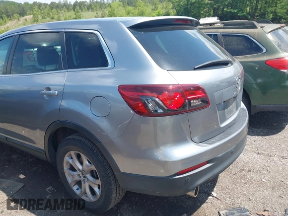 2015 Mazda CX-9 Touring with VIN JM3TB2CA2F0451180, listed as a IAAI auction lot 42180078 with 112,804 mi miles and . Bid and sale history available at carsss.com. Image 6.