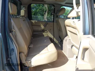 2011 Nissan Titan SL with VIN 1N6AA0EC7BN310833, listed as a IAAI auction lot 40140349 with 230,235 mi miles. Bid and sale history available at carsss.com. Image 8.