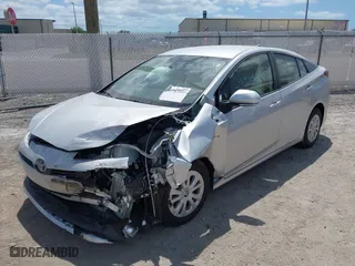 2022 Toyota Prius L Eco with VIN JTDKAMFU5N3184798, listed as a IAAI auction lot 41947227 with 35,943 mi miles. Bid and sale history available at carsss.com. Image 2.