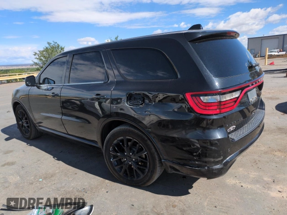 2015 Dodge Durango SXT with VIN 1C4RDHAG6FC850065, listed as a Copart auction lot 57144295 with 243,646 mi miles and Salvage title. Bid and sale history available at DreamBid. Image 2.