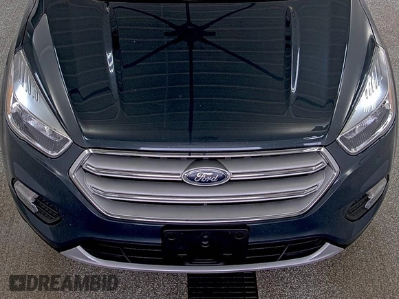 2019 Ford Escape SE z VIN 1FMCU9GD9KUA54757, wystawiony jako IAAI lot #42516631 z przebiegiem 87 040 mil mil oraz . Historia ofert i sprzedaży dostępna na DreamBid. Obrazek 24.