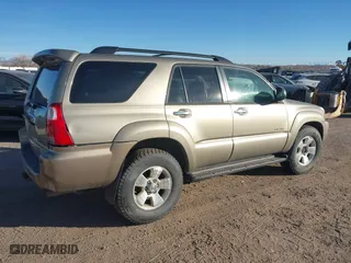 2006 Toyota 4Runner SR5 with VIN JTEBU14R568055724, listed as a IAAI auction lot 41450451 with 230,598 mi miles. Bid and sale history available at carsss.com. Image 4.
