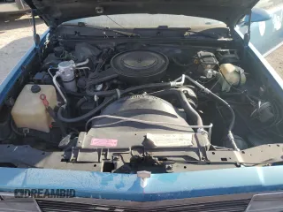 1987 Chevrolet El Camino z VIN 3GCCW80Z9HS905561, wystawiony jako Copart lot #75401604 z przebiegiem 32 958 mil mil oraz Szkody całkowita. Historia ofert i sprzedaży dostępna na DreamBid. Obrazek 11.