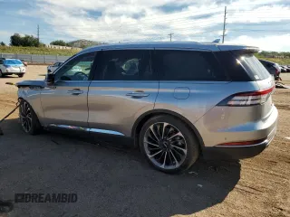2020 Lincoln Aviator Reserve z VIN 5LM5J7XC2LGL35647, wystawiony jako Copart lot #71263444 z przebiegiem 56 792 mil mil oraz Szkoda całkowita • Salvage title. Historia ofert i sprzedaży dostępna na DreamBid. Obrazek 2.