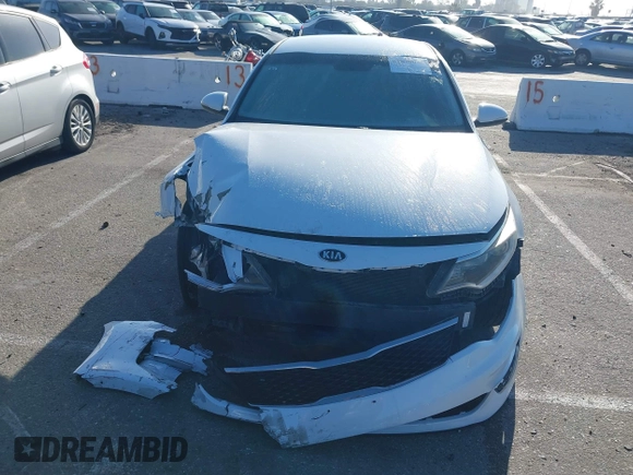 2016 Kia Optima LX with VIN 5XXGT4L33GG014082, listed as a IAAI auction lot 41870030 with 137,849 mi miles and . Bid and sale history available at DreamBid. Image 11.