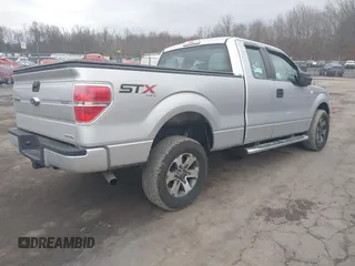 2014 Ford F-150 XL with VIN 1FTFX1EF2EFC81067, listed as a IAAI auction lot 41697190 with 105,584 mi miles. Bid and sale history available at carsss.com. Image 4.