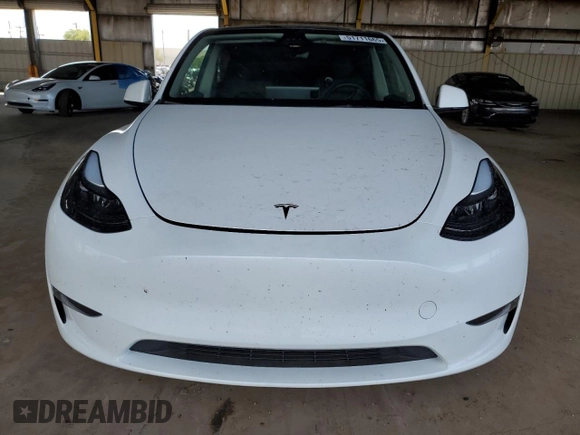 2024 Tesla Model Y Long Range with VIN 7SAYGDEE1RF165311, listed as a Copart auction lot 51711665 with 15,190 mi miles and Salvage Title. Bid and sale history available at DreamBid. Image 5.