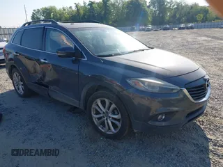 2013 Mazda CX-9 Grand Touring z VIN JM3TB2DA6D0424124, wystawiony jako IAAI lot #42032588 z przebiegiem 151 569 mil mil oraz . Historia ofert i sprzedaży dostępna na DreamBid. Obrazek 1.