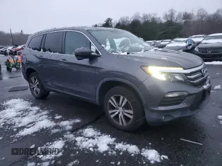2017 Honda Pilot EX-L with VIN 5FNYF6H54HB008054, listed as a Copart auction lot 82758704 with 124,024 mi miles and Salvage Title. Bid and sale history available at DreamBid. Image 4.