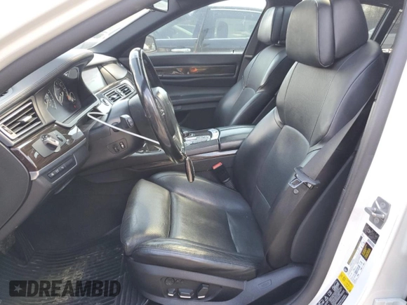 2012 BMW 7 Series 750i xDrive with VIN WBAKC6C56CC396591, listed as a Copart auction lot 53365865 with 119,603 mi miles and Salvage Title. Bid and sale history available at DreamBid. Image 7.
